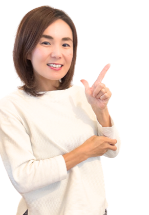 ほほえみながら案内するトコさん